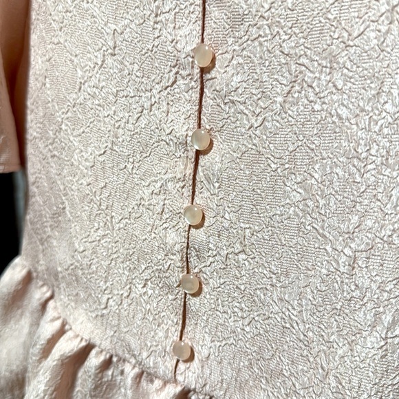 DIVIDED Elegant Pink Textured Top With Ruffled Bottom - Picture 2 of 4